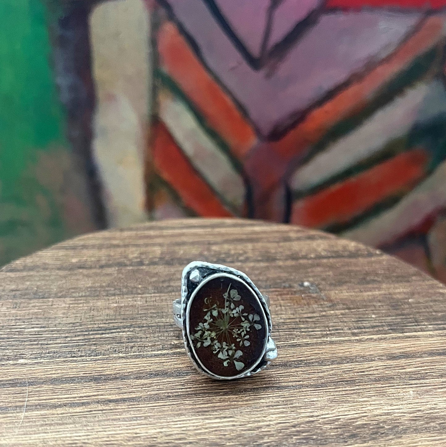 Asymmetrical cosmos ring